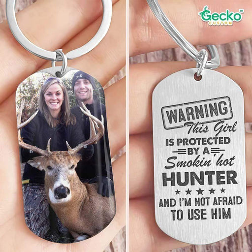 GeckoCustom This Girl Is Protected By A Smokin' Hot Hunter Valentine Metal Keychain HN590 No Gift box / 1.77" x 1.06"